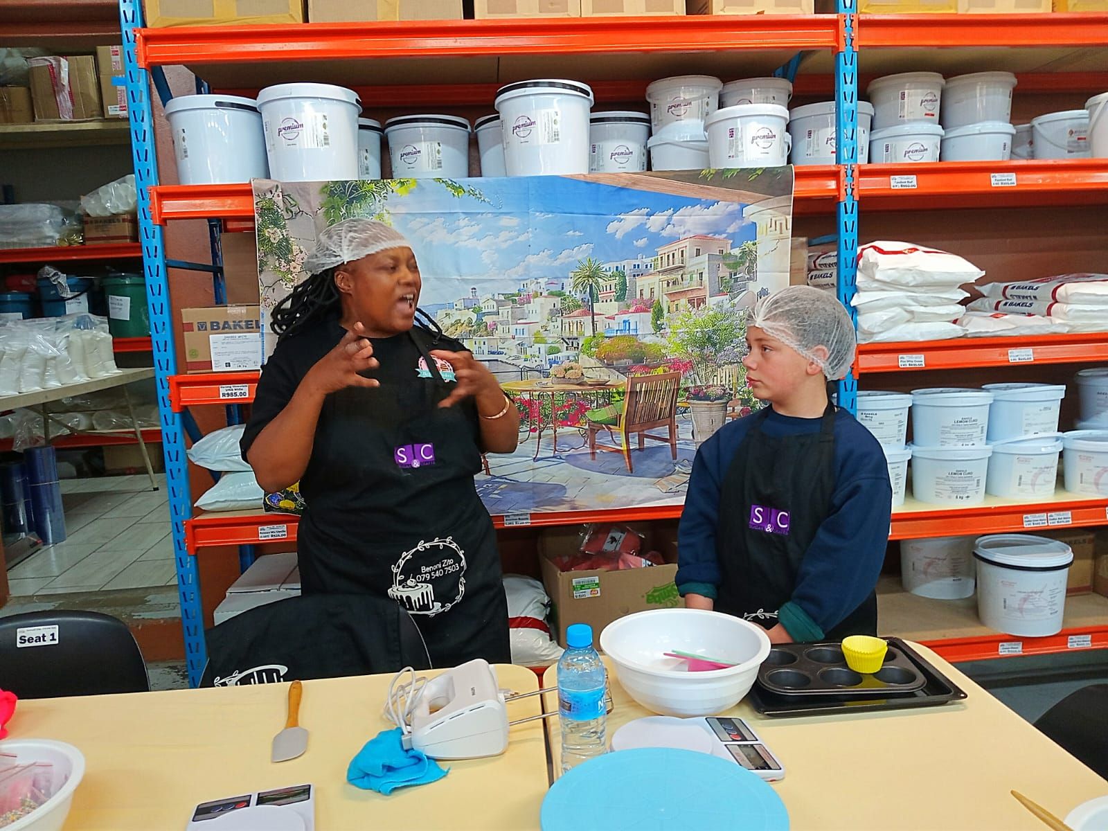 Chef Bobo Talking a Class Through the Method — baked by Bobo's Cakes & Catering