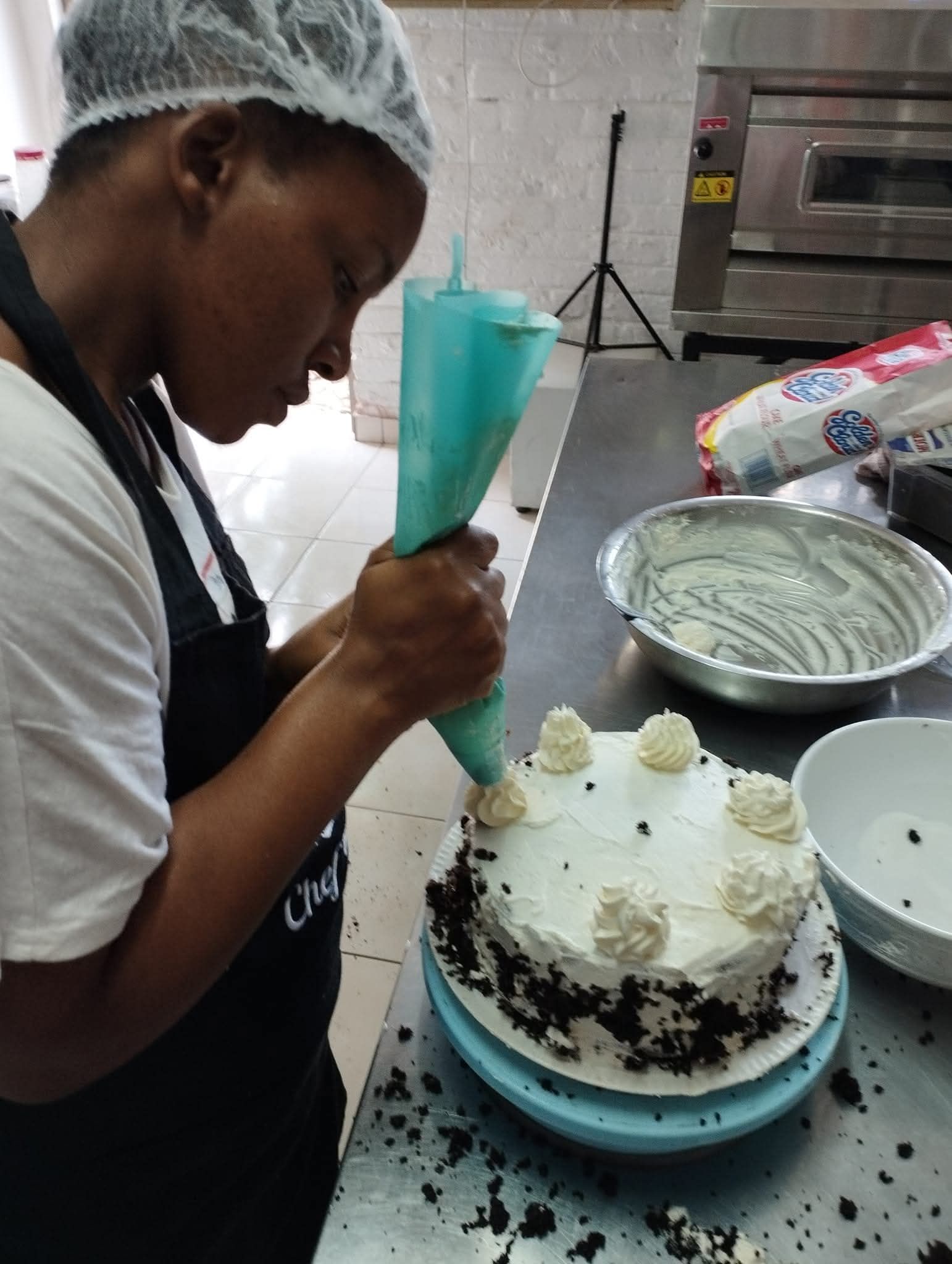 Piping Practice in the Kitchen — baked by Bobo's Cakes & Catering