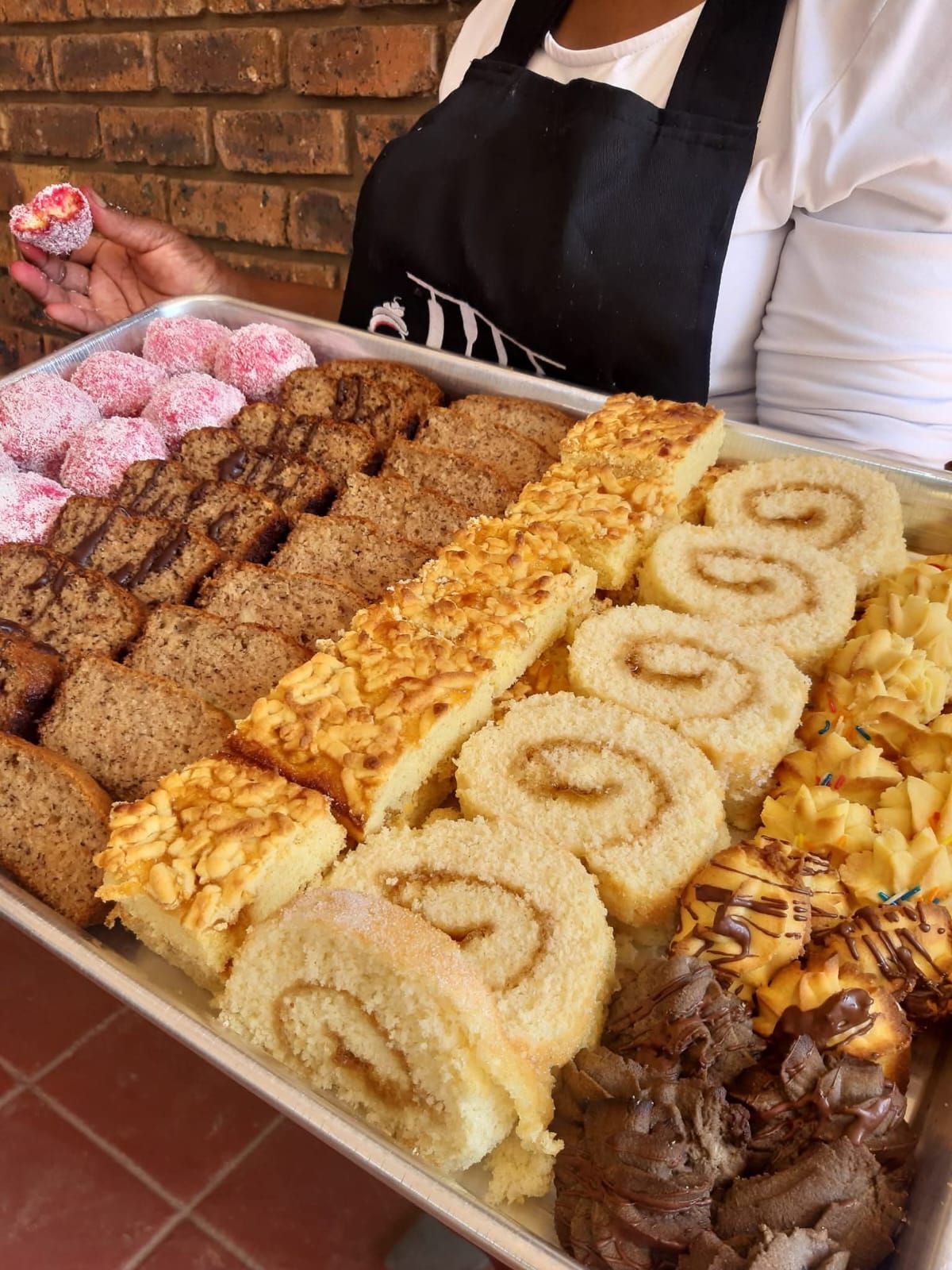 Tray of Snowballs, Loaves & Swiss Rolls — baked by Bobo's Cakes & Catering