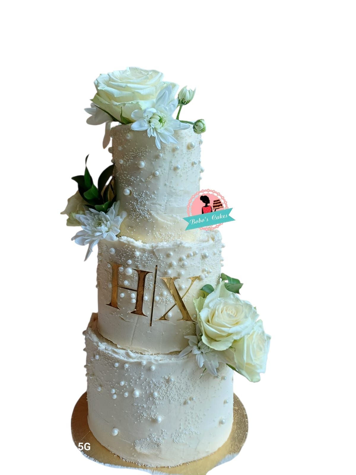 Three-Tier Pearl Wedding Cake — baked by Bobo's Cakes & Catering